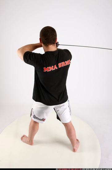 Man Adult Athletic White Fighting with sword Standing poses Sportswear