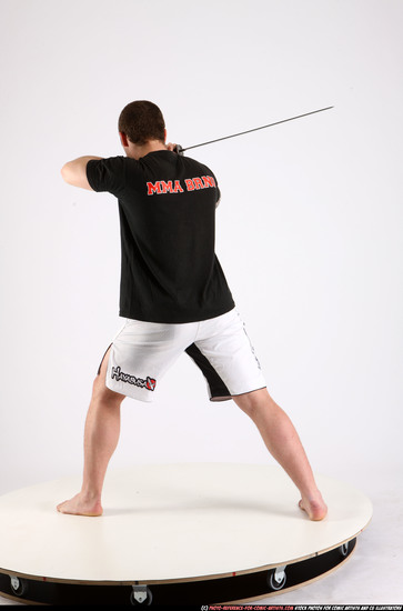 Man Adult Athletic White Fighting with sword Standing poses Sportswear