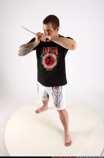 Man Adult Athletic White Fighting with sword Standing poses Sportswear