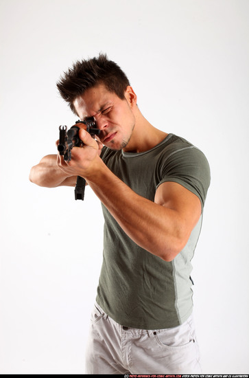 Man Adult Athletic White Fighting with submachine gun Standing poses Casual