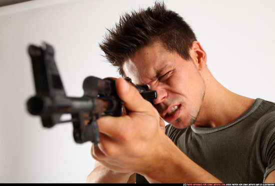 Man Adult Athletic White Fighting with submachine gun Standing poses Casual