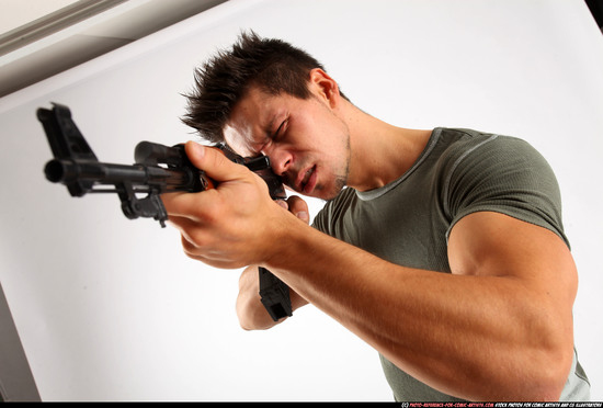 Man Adult Athletic White Fighting with submachine gun Standing poses Casual