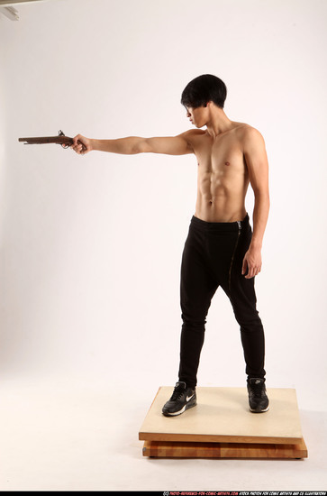 Man Young Athletic Fighting with rifle Standing poses Pants Asian