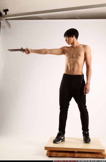 Man Young Athletic Fighting with rifle Standing poses Pants Asian