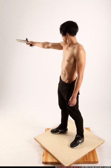 Man Young Athletic Fighting with rifle Standing poses Pants Asian