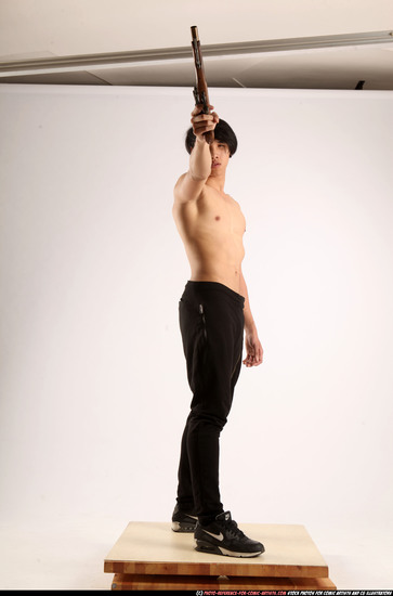 Man Young Athletic Fighting with rifle Standing poses Pants Asian