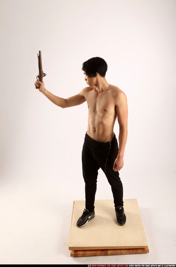 Man Young Athletic Fighting with rifle Standing poses Pants Asian