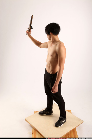 Man Young Athletic Fighting with rifle Standing poses Pants Asian