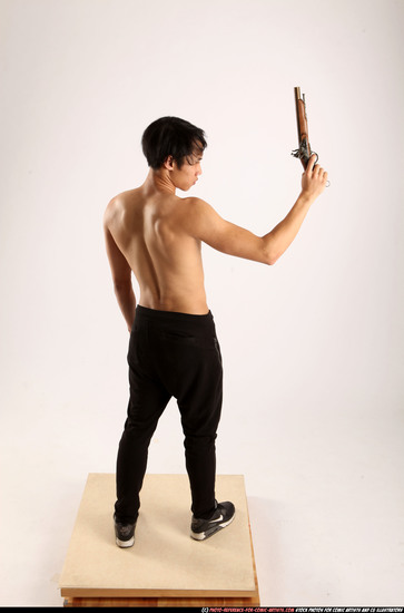 Man Young Athletic Fighting with rifle Standing poses Pants Asian