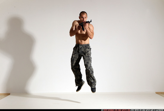 Man Adult Muscular White Fighting with submachine gun Moving poses Pants