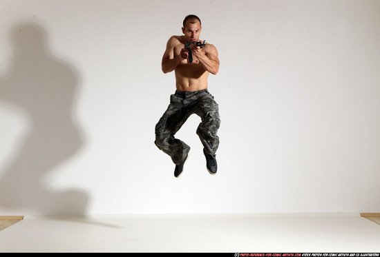 Man Adult Muscular White Fighting with submachine gun Moving poses Pants