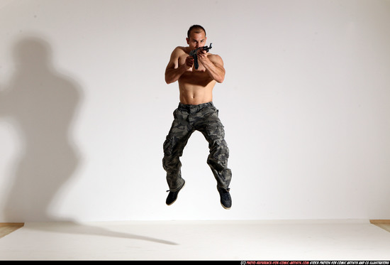 Man Adult Muscular White Fighting with submachine gun Moving poses Pants