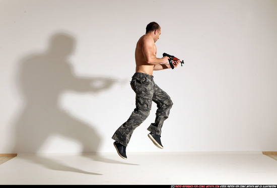 Man Adult Muscular White Fighting with submachine gun Moving poses Pants