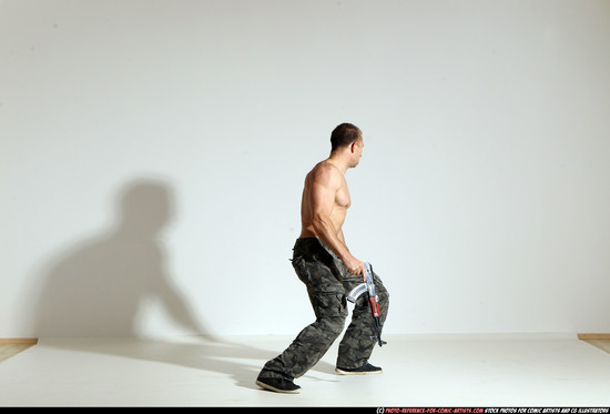 Man Adult Muscular White Fighting with submachine gun Moving poses Pants