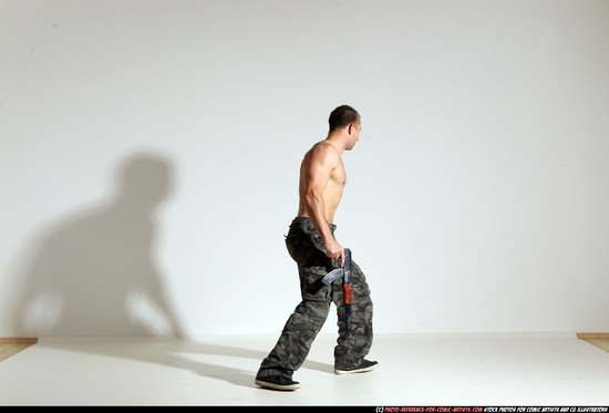 Man Adult Muscular White Fighting with submachine gun Moving poses Pants