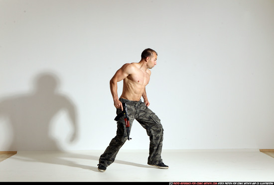 Man Adult Muscular White Fighting with submachine gun Moving poses Pants