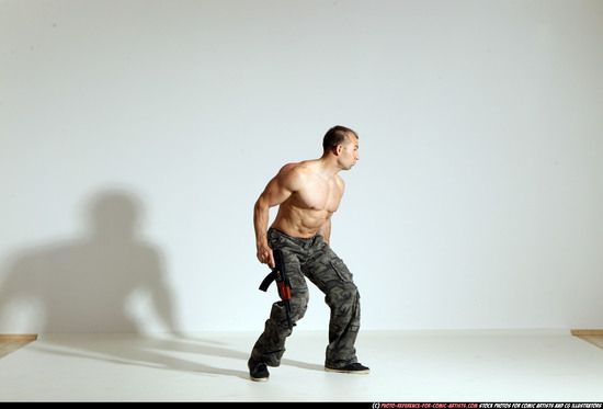 Man Adult Muscular White Fighting with submachine gun Moving poses Pants