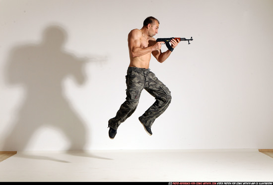 Man Adult Muscular White Fighting with submachine gun Moving poses Pants