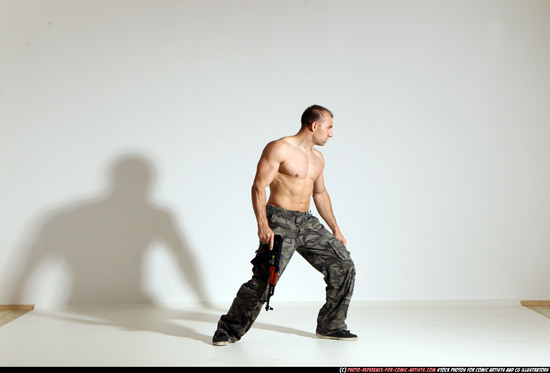 Man Adult Muscular White Fighting with submachine gun Moving poses Pants