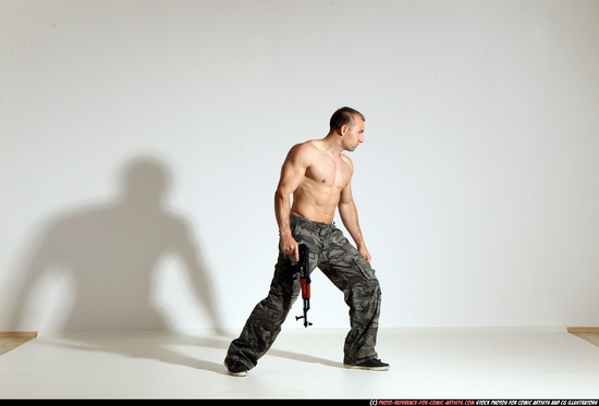 Man Adult Muscular White Fighting with submachine gun Moving poses Pants