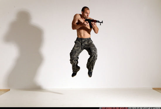 Man Adult Muscular White Fighting with submachine gun Moving poses Pants