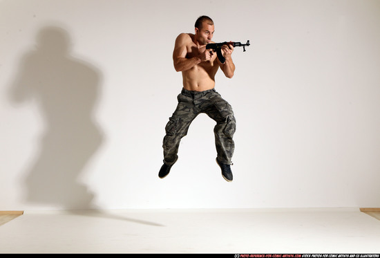 Man Adult Muscular White Fighting with submachine gun Moving poses Pants