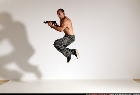 Man Adult Muscular White Fighting with submachine gun Moving poses Pants