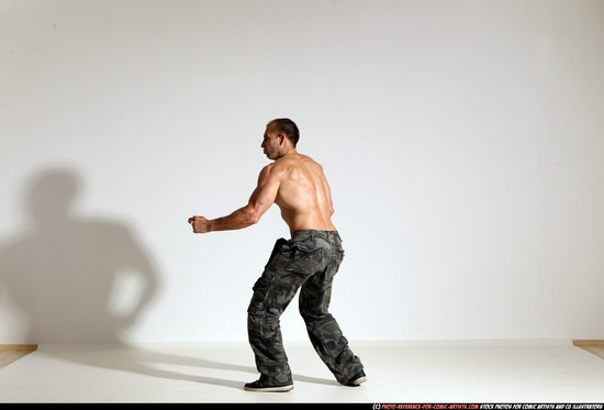 Man Adult Muscular White Fighting with submachine gun Moving poses Pants