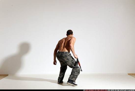 Man Adult Muscular White Fighting with submachine gun Moving poses Pants