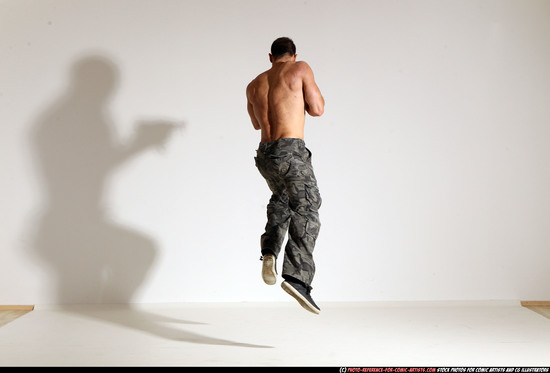 Man Adult Muscular White Fighting with submachine gun Moving poses Pants