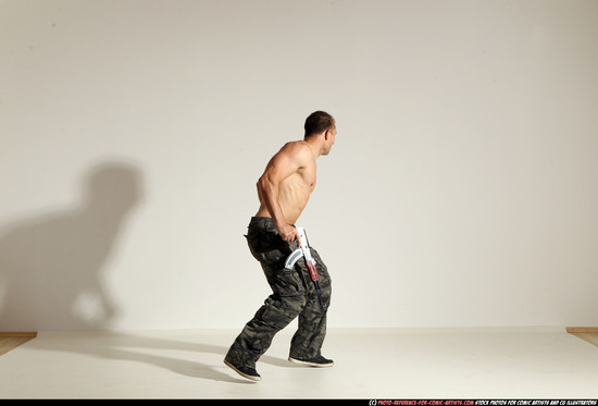 Man Adult Muscular White Fighting with submachine gun Moving poses Pants