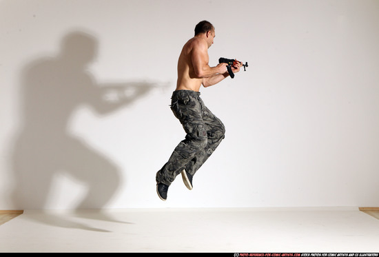 Man Adult Muscular White Fighting with submachine gun Moving poses Pants