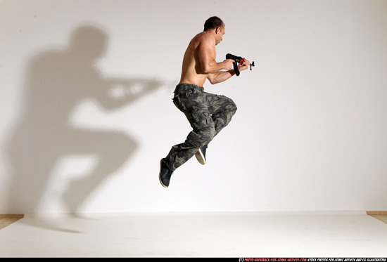 Man Adult Muscular White Fighting with submachine gun Moving poses Pants