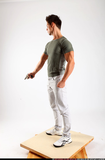 Man Adult Athletic White Fighting with gun Standing poses Casual