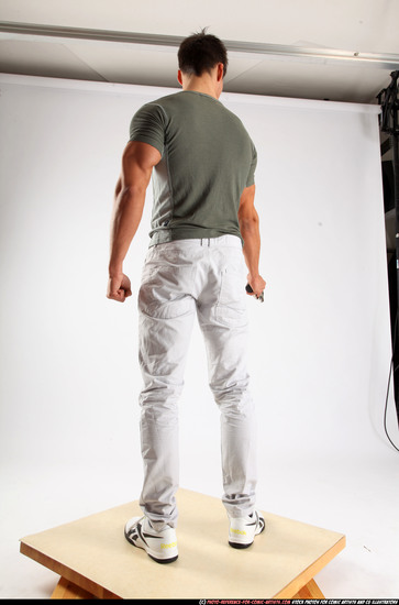 Man Adult Athletic White Fighting with gun Standing poses Casual