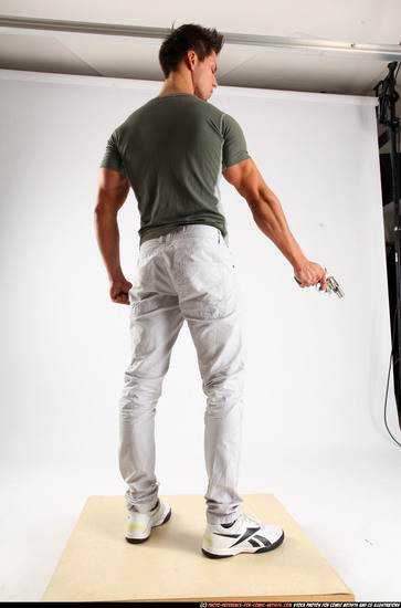 Man Adult Athletic White Fighting with gun Standing poses Casual