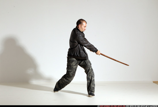 Man Adult Athletic White Fighting with sword Moving poses Casual