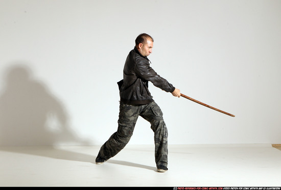 Man Adult Athletic White Fighting with sword Moving poses Casual