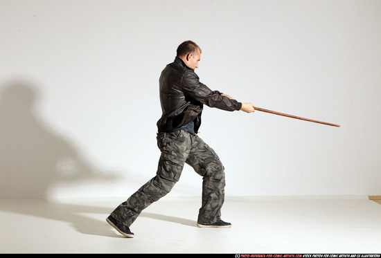 Man Adult Athletic White Fighting with sword Moving poses Casual