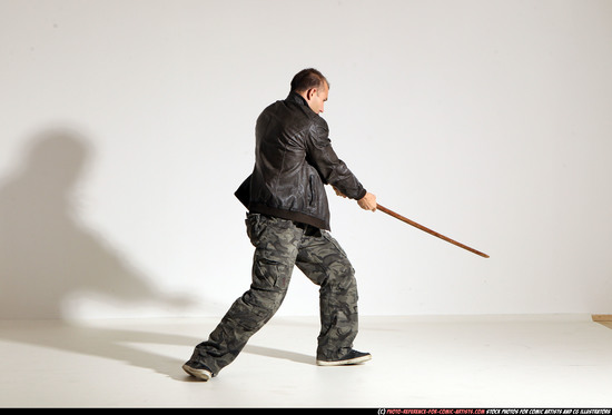 Man Adult Athletic White Fighting with sword Moving poses Casual