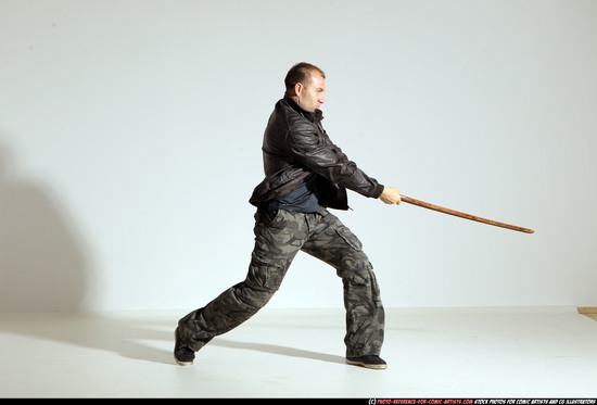 Man Adult Athletic White Fighting with sword Moving poses Casual