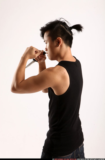 Man Young Athletic Fighting with knife Standing poses Casual Asian