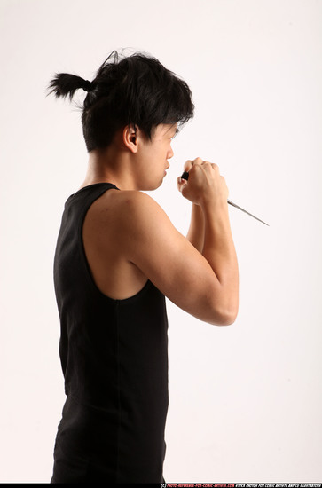 Man Young Athletic Fighting with knife Standing poses Casual Asian