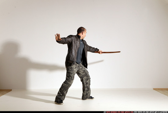 Man Adult Athletic White Fighting with sword Moving poses Casual