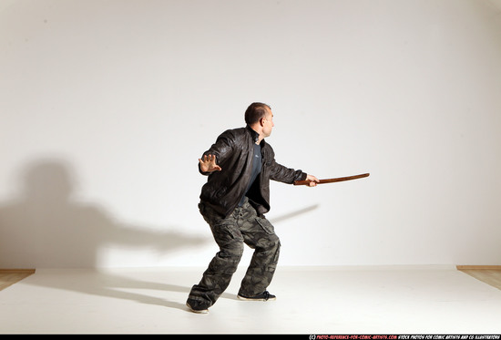 Man Adult Athletic White Fighting with sword Moving poses Casual