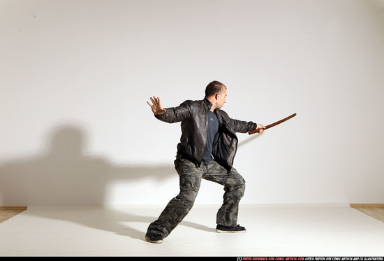 Man Adult Athletic White Fighting with sword Moving poses Casual