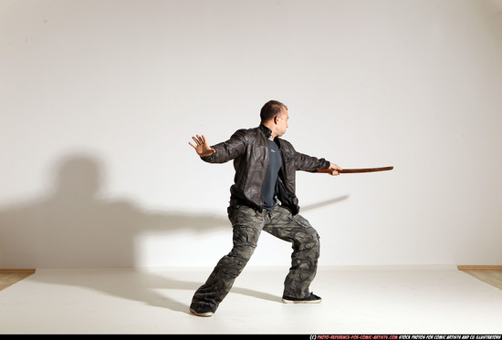 Man Adult Athletic White Fighting with sword Moving poses Casual