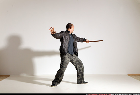 Man Adult Athletic White Fighting with sword Moving poses Casual