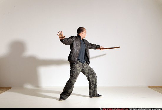 Man Adult Athletic White Fighting with sword Moving poses Casual