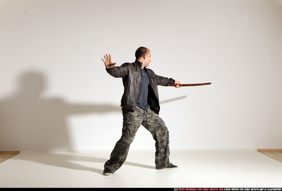 Man Adult Athletic White Fighting with sword Moving poses Casual